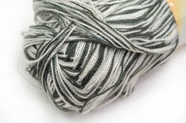 Sewing products. Roll of black and white yarn. This yarn has a great color and is suitable for crocheting, knitting and braiding.