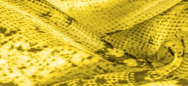 正方形のパターンを持つ黄色の生地 明るい黄色の生地の背景色を閉じます 背景やテクスチャパターン — ストック写真