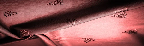 silk fabric, red, sienna, fine pattern, which is a combination of lines, colors, shadows. texture background, pattern