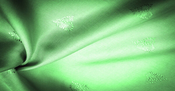 silk fabric, silk fabric, deep emerald, malachite, jade, fine pattern, pattern, which is a combination of lines, colors, shadows. texture background, pattern