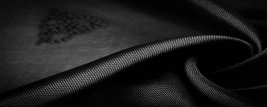 İpek kumaş, koyu siyah küçük desen, çizgilerin, renklerin ve gölgelerin birleşimi. doku arkaplanı, desen