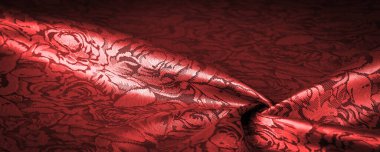 Çiçek desenli kırmızı ipek kumaş, güzel görünüş, eşsiz parlaklık kabartmalı desen, bileşik tekstil. rahatlama deseni