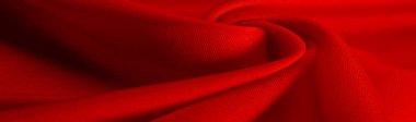 Kırmızı ipek kumaş, zarif, dalgalı, yakut rengi ipek, lüks kumaş, soyut tasarım. arkaplan dokusu, desen