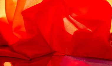 Kırmızı ipek kumaş, zarif, dalgalı, yakut rengi ipek, lüks kumaş, soyut tasarım. arkaplan dokusu, desen