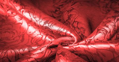 Çiçek desenli kırmızı ipek kumaş, güzel görünüş, eşsiz parlaklık kabartmalı desen, bileşik tekstil. rahatlama deseni