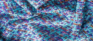 Arka plan dokusu, desen. Kış kumaşı, sıcak. Büyük örgülü iplik. Mavi-kırmızı sarı iplikler. Bu fotoğraf senin tasarımını en iyi yapacak. Duvar kağıtları, resimler, posterler.