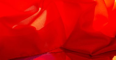 Kırmızı ipek kumaş, yakut rengi ipek kumaş, doku arka planı, makro. soyut tasarım.