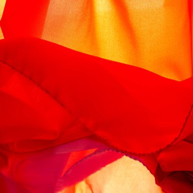 Kırmızı ipek kumaş, yakut rengi ipek kumaş, doku arka planı, makro. soyut tasarım.