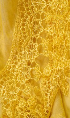 Doku, arkaplan, desen, kartpostal, ipek kumaş, dantel ambalajlı kadın sarı atkısı. Yazdırma ve dijital materyallerinizi oluşturmak için bu süslü resimleri kullanın.