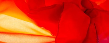 Kırmızı ipek kumaş, yakut rengi ipek kumaş, doku arka planı, makro. soyut tasarım.