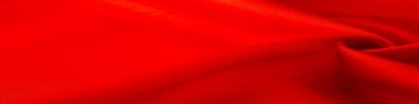 Kırmızı ipek kumaş, yakut rengi ipek kumaş, doku arka planı, makro. Soyut tasarım. şablon