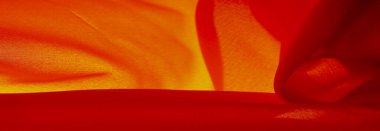 Kırmızı ipek kumaş, yakut rengi ipek kumaş, doku arka planı, makro. Soyut tasarım. şablon