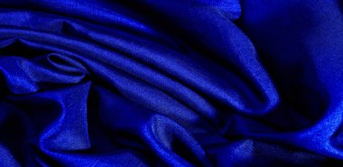 Mavi kumaş. Doğal kumaştan soyut kırmızı arkaplan. Pamuk. Doku, arkaplan, desen