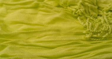 İpek kumaş, yeşil renk, yapay buruşuk kumaş, buruşuk doku, soyut çizim. Doku arkaplanı, desen