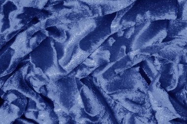 Mavi renkli Kadife kumaşın dokuma desenli kadife kumaşı lüksle eş anlamlıdır. Kadifenin en karakteristik özelliklerinden biri yumuşak tüylü yığını kadifeyi yumuşakça zengin kılar.