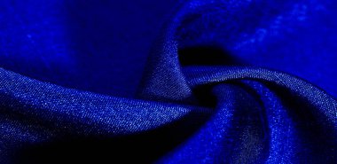 Mavi kumaş. Doğal kumaştan soyut kırmızı arkaplan. Pamuk. Doku, arkaplan, desen