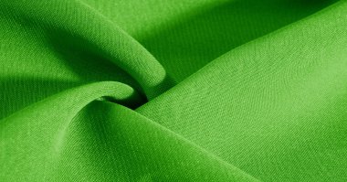 yeşil ipek kumaş. Hoş bir parlaklığı olan çok hafif yapışkan kumaş. Çevrimiçi projelerine zarafet katmak için mükemmel. doku, arkaplan, desen,