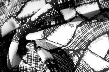 doku, arkaplan, desen. Siyah soyut figürlü beyaz kumaş. İlham her projenin özünde yatar. Güzel bir tasarım yapsanız da yapsanız da fark etmez.,