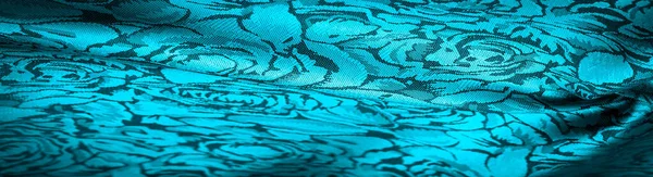 Çiçek desenli mavi ipek kumaş, olağanüstü hoş görsel duyular: güzel görünüş, eşsiz parlaklık, kabartmalı desen, kompozit tekstil