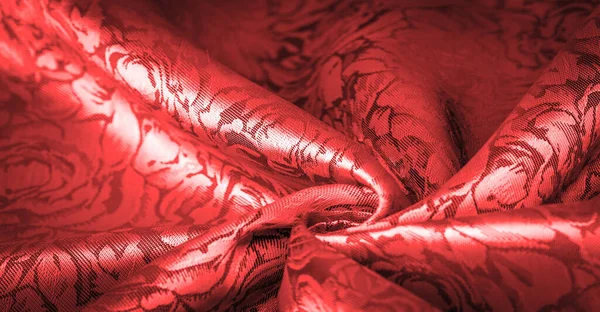 Çiçek desenli kırmızı ipek kumaş, güzel görünüş, eşsiz parlaklık kabartmalı desen, bileşik tekstil. rahatlama deseni