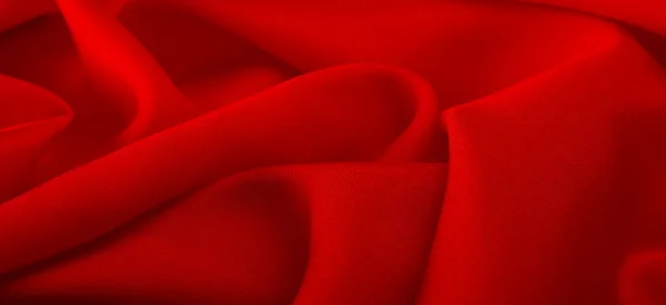 赤い絹の生地ルビーサテンの絹の生地テクスチャの背景マクロ 抽象的なデザイン — ストック写真