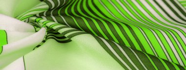 İpek kumaş, geometrik kesişim çizgileri, farklı tonlarda düz çizgilerin yeşil ve beyaz deseni, geometrik desen, doku