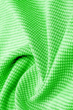 Arka plan dokusu, desenli kumaş, dikişli yeşil iplikli sıcak yün. Klasiklerden etkilenenler için zeytin, yeşil ve zümrütle harmanlanmış bu bağbozumundan esinlensinler.