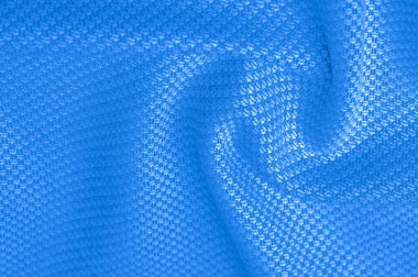 Yün kumaşın rengi mavi, süper yumuşak ve pofuduk eli ise açık bir desen. Arkaplan dokusu