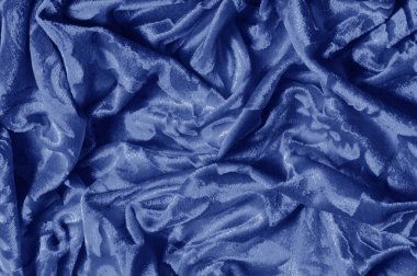 Mavi renkli Kadife kumaşın dokuma desenli kadife kumaşı lüksle eş anlamlıdır. Kadifenin en karakteristik özelliklerinden biri yumuşak tüylü yığını kadifeyi yumuşakça zengin kılar.