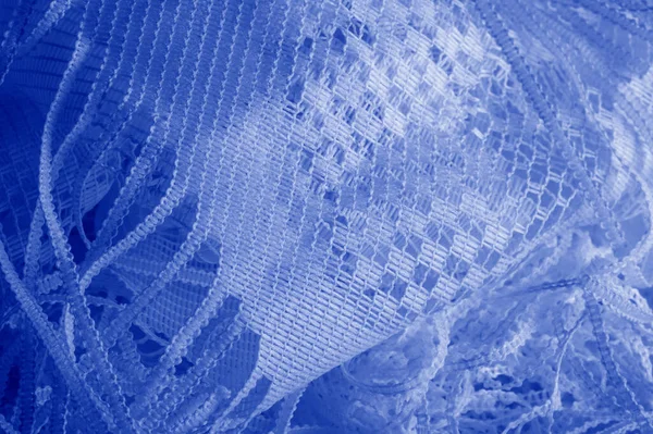 Mavi tül kumaş dokusu, yumuşak malzemeli lüks tül kumaş deseni. Doku, arkaplan, desen.