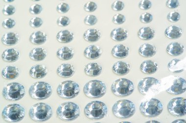 Dekoratif parlak pulların yakın plan çekimi.