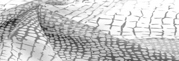   python skin silk fabric, white and black pattern, african theme, fark, sable, ebon, smutty Texture. Background.