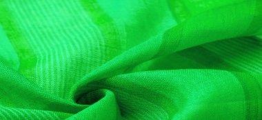  Beyaz çizgili kumaş, projeleriniz için kalın ve parlak bir kumaş. Kocaman bir vadide pek çok yumuşak düzlükleri var. Doku, arkaplan, tıkırtı