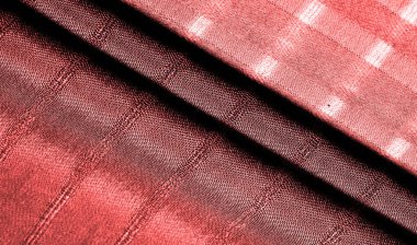 Doku, arkaplan, şekil, çizgileri olan basit kırmızı kumaş. İpliğin çıkarılması ile oluşan çizgiler,