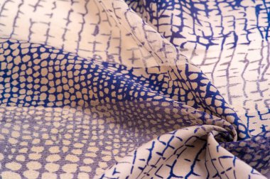 Doku. Geçmişi. Şablon. Piton derisi şeklinde ipek kumaş, lacivert desen, Afrika teması