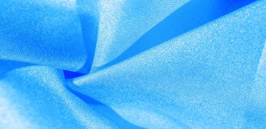 Mavili ipek kumaş. Bu ipek inanılmaz derecede zarif. Bundan elde edilen projeler uzun süre devam edecek ve hala oldukça iyi durumda olacak..