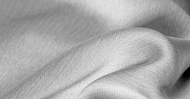  Beyaz ipek kumaş. Pürüzsüz bir bitişi var. Tasarımdan projelerinize kadar her şey için bu lüks kumaşı kullanın. Arkaplan, desen, doku