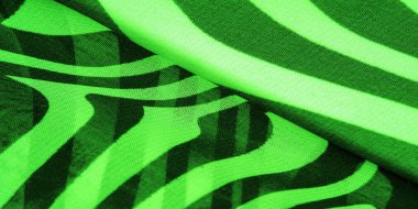 İpek kumaş, yeşil ve beyaz soyut çizgiler. Soyut beyaz ve yeşil desenlerin sihirli formu. Retro modern dekor, tekstil sanatı, tasarım, doku, arkaplan, kalıp