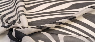 İpek kumaş, siyah beyaz soyut çizgiler. Soyut siyah beyaz desenli büyülü bir şekil. Retro modern dekor, tekstil sanatı, tasarım, doku, arkaplan, kalıp