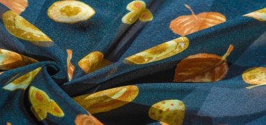 İpek kumaş, mavi ve sarı sonbahar yaprakları. Doku, arkaplan deseni