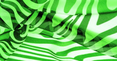 İpek kumaş, yeşil ve beyaz soyut çizgiler. Soyut beyaz ve yeşil desenlerin sihirli formu. Retro modern dekor, tekstil sanatı, tasarım, doku, arkaplan, kalıp