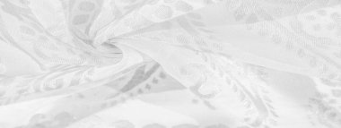 İpek kumaş, kar beyazı kumaş. Beyaz arka planda zarif çiçeklerin gölgeleri, Paisley 'nin fotoğrafı. Doku, desen, koleksiyon