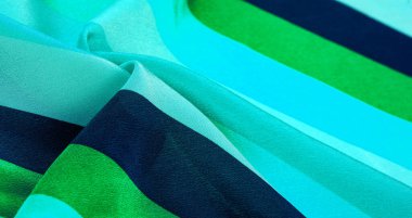 İpek kumaş, mavi çizgili kumaş ve gök mavisi yeşil ve beyaz çizgiler, zarif tasarım. Doku, desen, arkaplan, koleksiyon