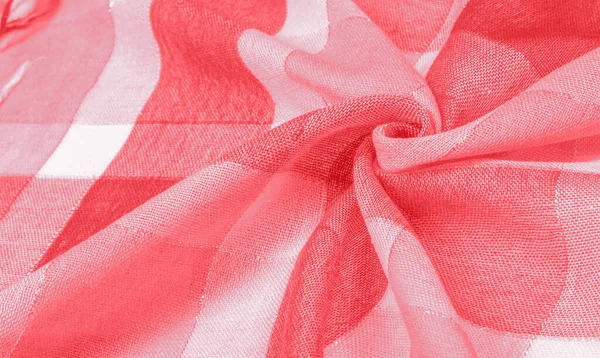 silk scarf female red in color with a metal stripe. The scarf is decorated with a delicate patchwork pattern in pastel shades of abstract Texture