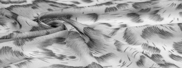 Afrika usulü siyah beyaz ipek kumaş. Tasarımcı, doku deseni, arkaplan koleksiyonu.