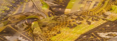 ipek kumaş, yeşil-kahverengi, soyut arka plan kumaşı veya sıvı dalga veya grunge ipek kumaş kıvrımlı kadife kumaş veya lüks Noel arkaplanı veya zarif duvar kağıdı tasarımı