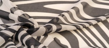 İpek kumaş, siyah beyaz soyut çizgiler. Soyut siyah beyaz desenli büyülü bir şekil. Retro modern dekor, tekstil sanatı, tasarım, doku, arkaplan, kalıp