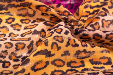 Leopar desenli ipek kahverengi kumaş. Leopar desenli açık ipek senin tasarımına mükemmel uyacak, modaya uygun ve kaba değil! Doku, arkaplan, desen