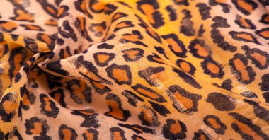 Leopar desenli ipek kahverengi kumaş. Leopar desenli açık ipek senin tasarımına mükemmel uyacak, modaya uygun ve kaba değil! Doku, arkaplan, desen