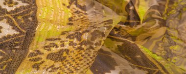 ipek kumaş, yeşil-kahverengi, soyut arka plan kumaşı veya sıvı dalga veya grunge ipek kumaş kıvrımlı kadife kumaş veya lüks Noel arkaplanı veya zarif duvar kağıdı tasarımı